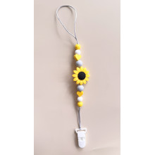 Держатель для пустышки Mommy Bag Подсолнух желто-серый Держатель для пустышки Mommy Bag Подсолнух желто-серый