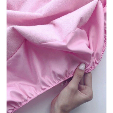 Непромокаемый наматрасник на резинке в кроватку - Розовый